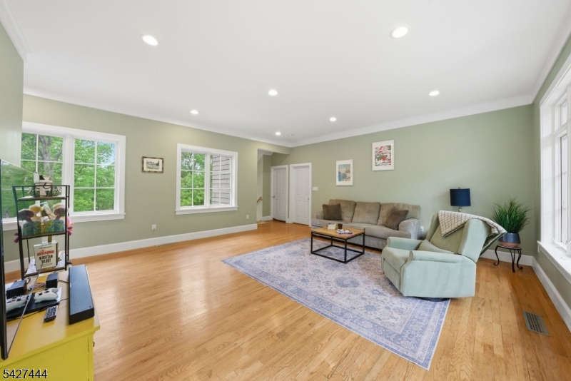 156 Kingsland Road Boonton, NJ 07005 - Photo 16 of 38 a living room with furniture and a wooden floor