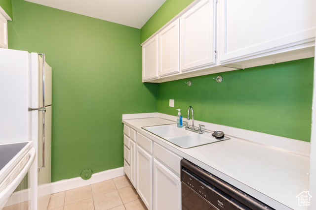 167 East 100 North, Unit B Logan, UT 84321 - Photo 6 of 18 Kitchen with white cabinets, light countertops, light tile patterned flooring, dishwasher, and white range with electric cooktop