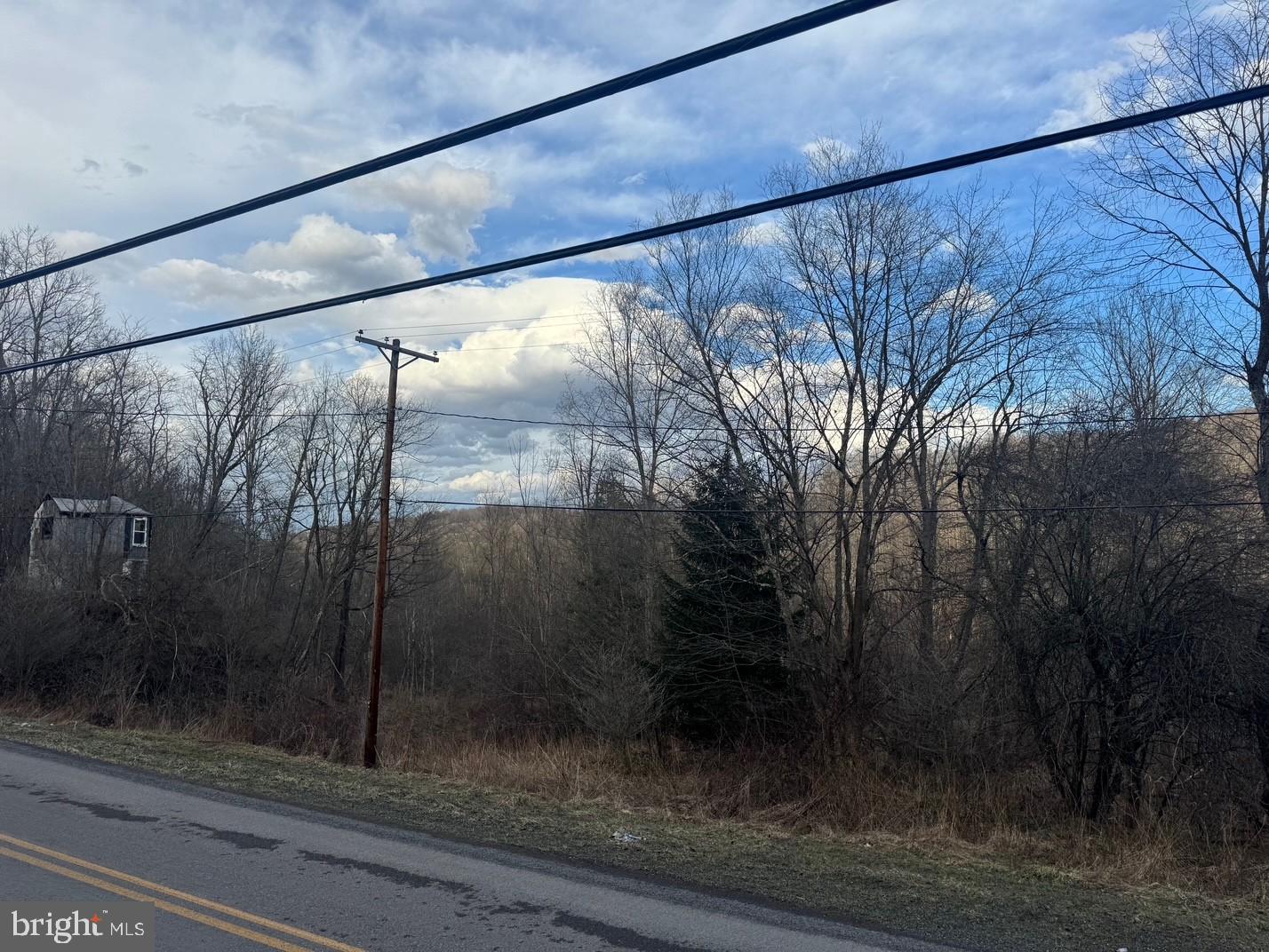 Jennings Road Grantsville, MD 21536 - Photo 31 of 39 a bathroom with a glass shower door