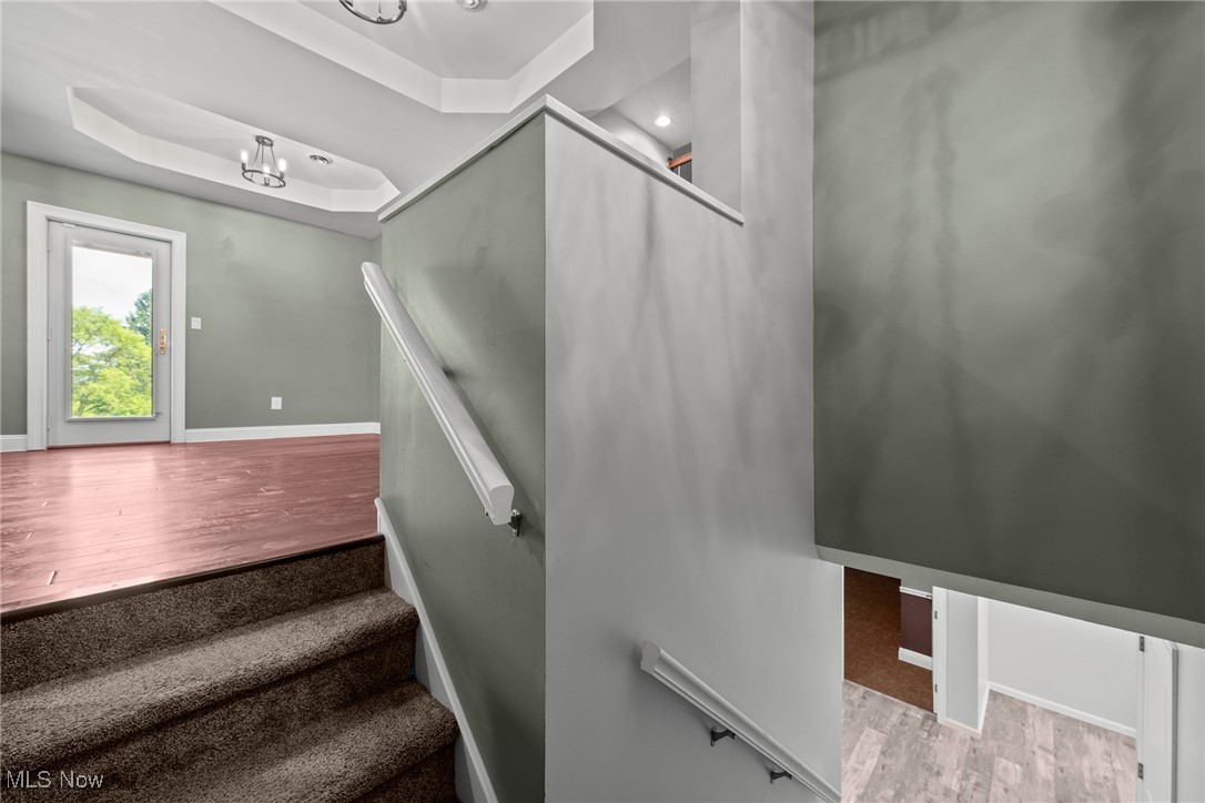 8888 Wilson Mills Road Chesterland, OH 44026 - Photo 25 of 42 Staircase to Lower Level