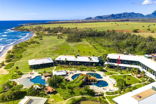 a view of an swimming pool and an outdoor seating