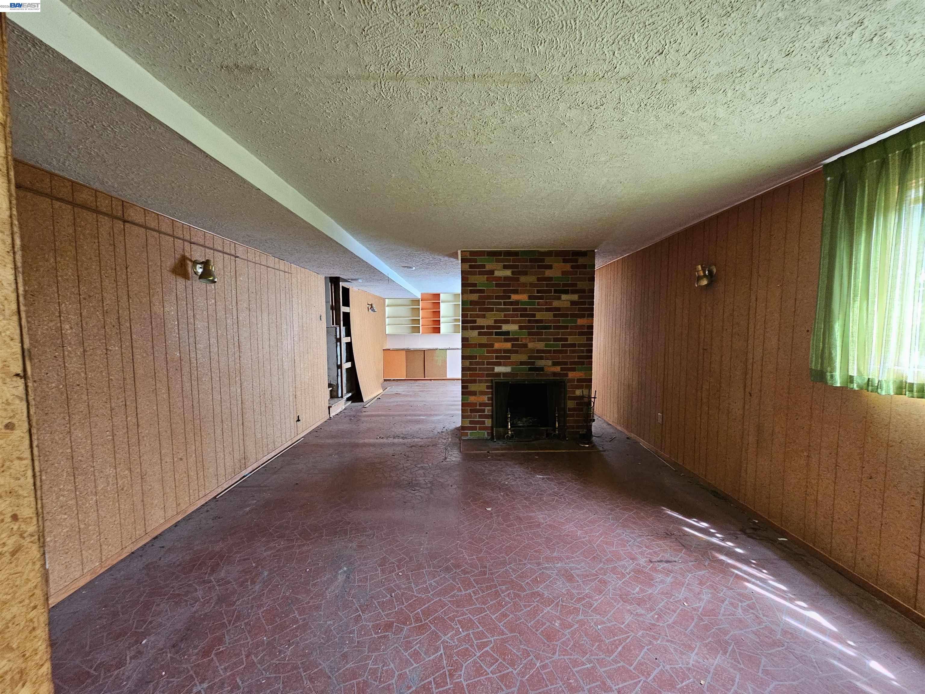 18758 Crane Avenue Castro Valley, CA 94546 - Photo 11 of 13 a view of an empty room with a fireplace