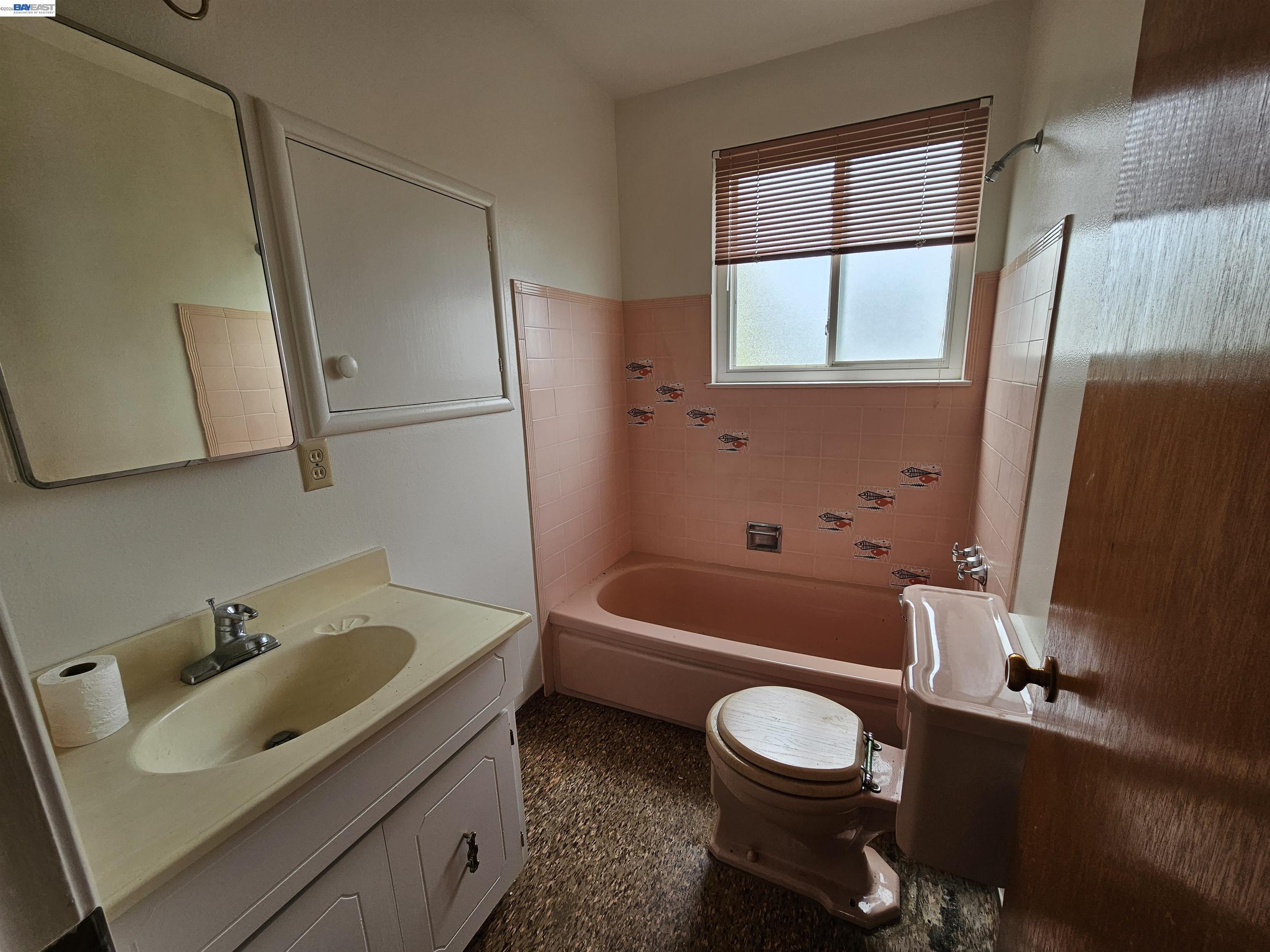 18758 Crane Avenue Castro Valley, CA 94546 - Photo 5 of 13 a bathroom with a sink toilet and shower
