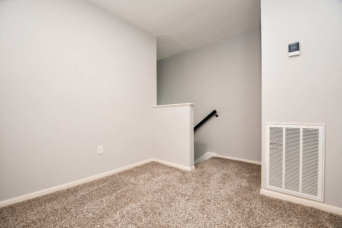 14011 Wickersham Lane Houston, TX 77077 - Photo 26 of 38 an empty room with windows