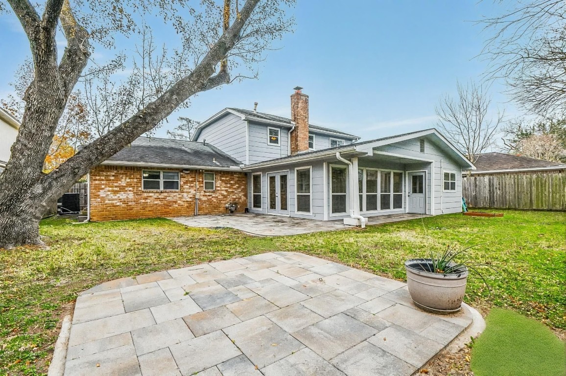 14011 Wickersham Lane Houston, TX 77077 - Photo 37 of 38 a front view of a house with a yard