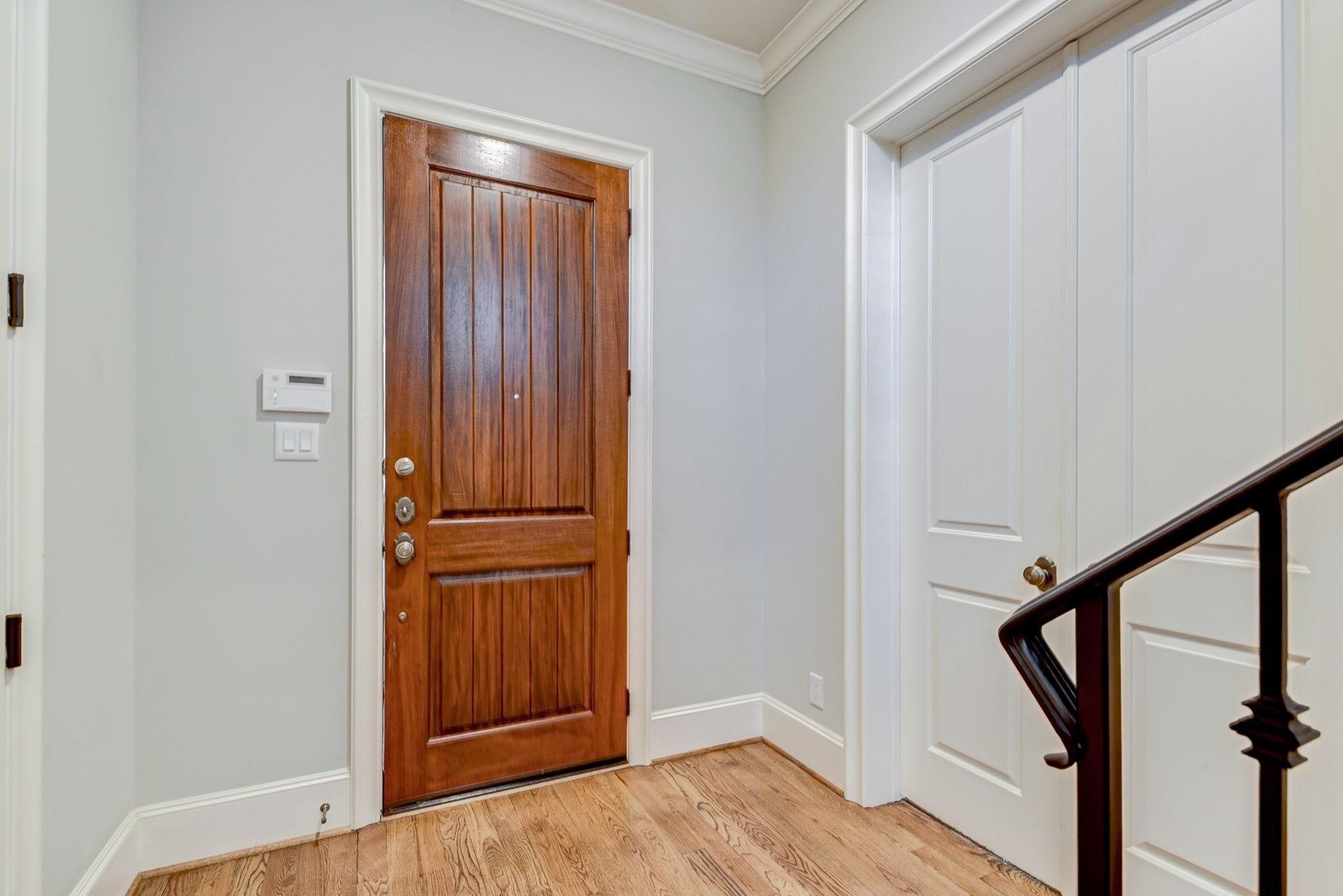 4506 Jackson Street Houston, TX 77004 - Photo 16 of 29 a view of front door with wooden floor