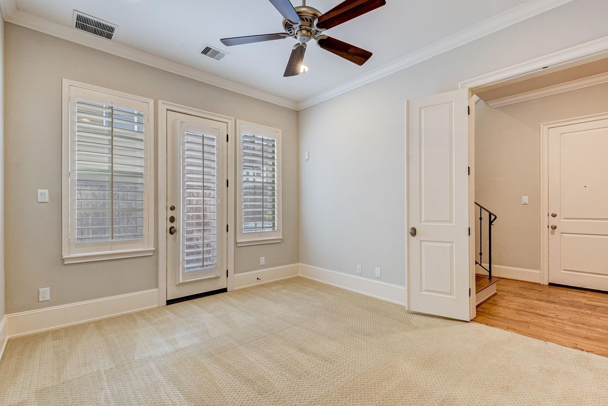 4506 Jackson Street Houston, TX 77004 - Photo 9 of 29 an empty room with windows and closet