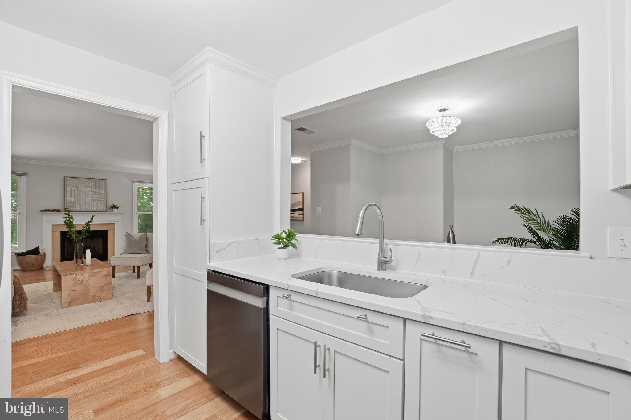 1495 Church Hill Place Reston, VA 20194 - Photo 4 of 27 a bathroom with a sink and a mirror