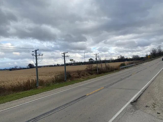 a view of a lake with a big yard
