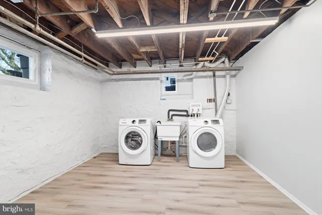 a utility room with dryer and washer