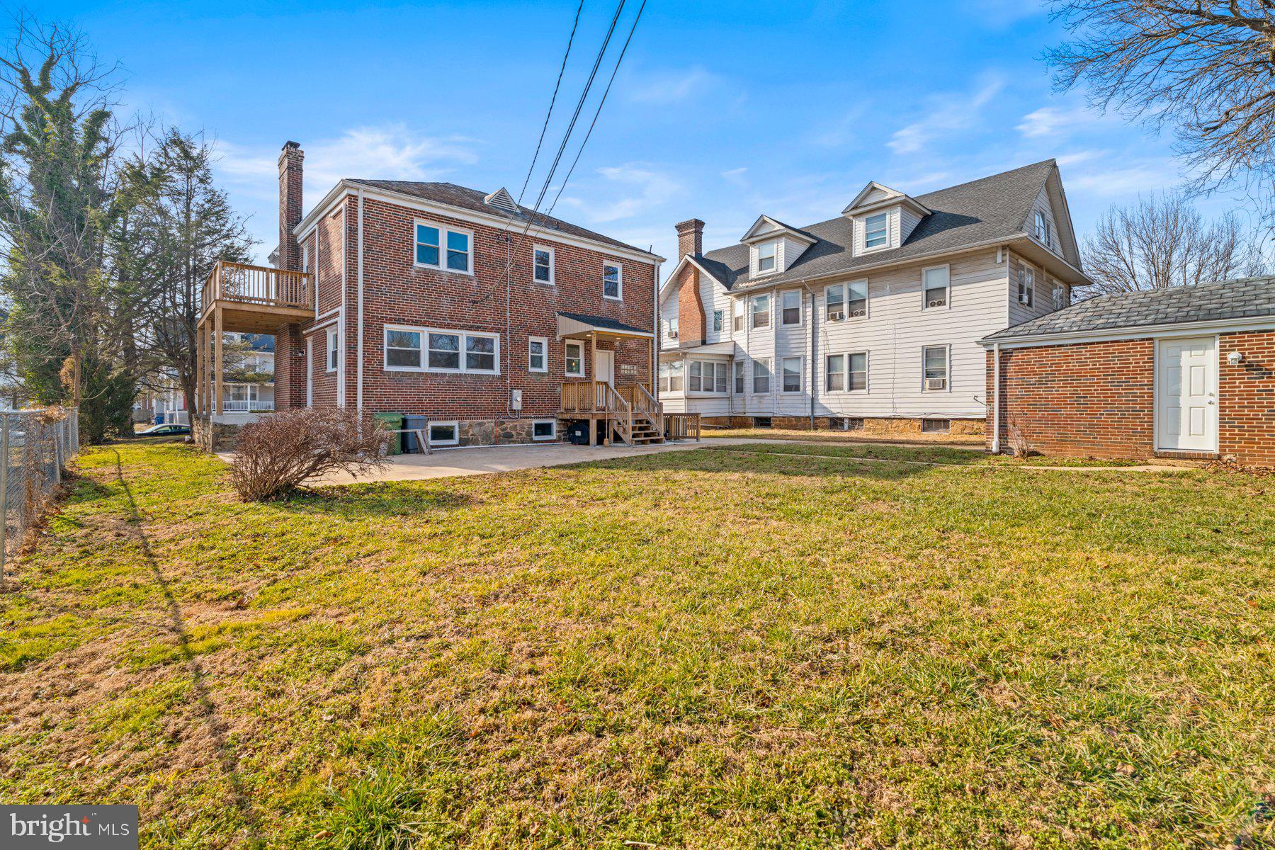 3704 Egerton Road Baltimore, MD 21215 - Photo 31 of 32 a house view with swimming pool in front of it
