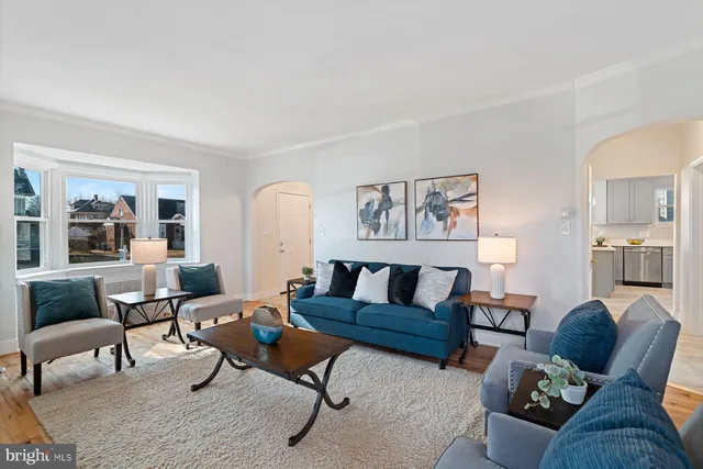 a living room with furniture and a couch