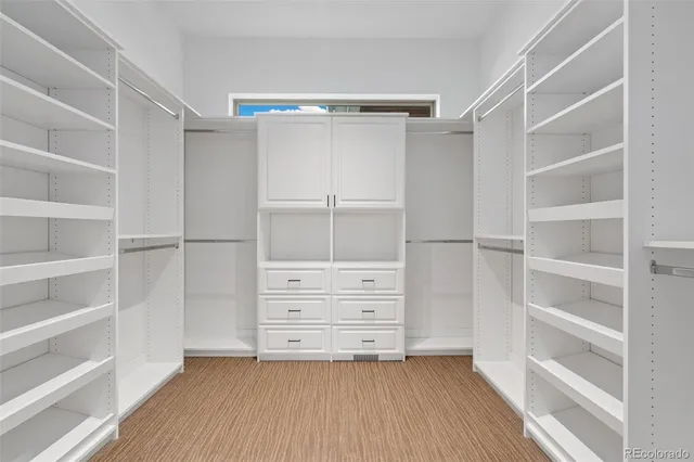 a bathroom with a tub and a sink