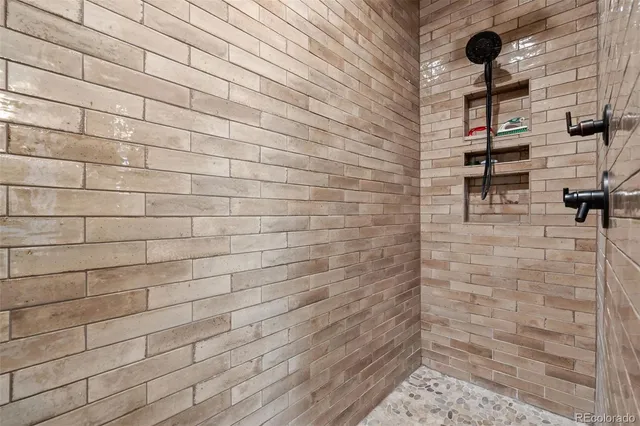 a utility room with sink dryer and washer