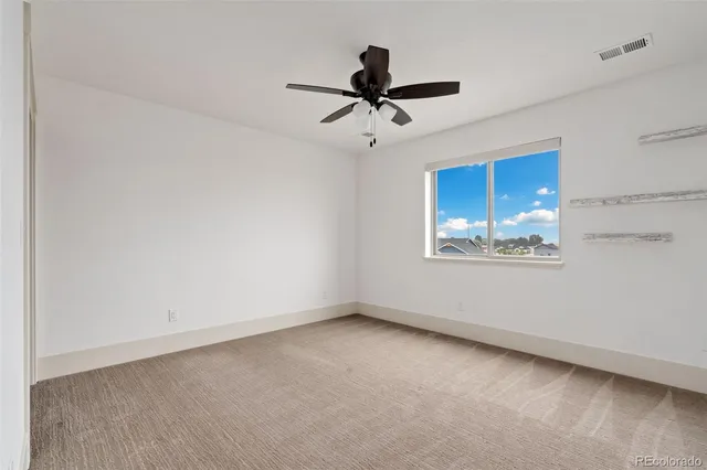 an empty room with window