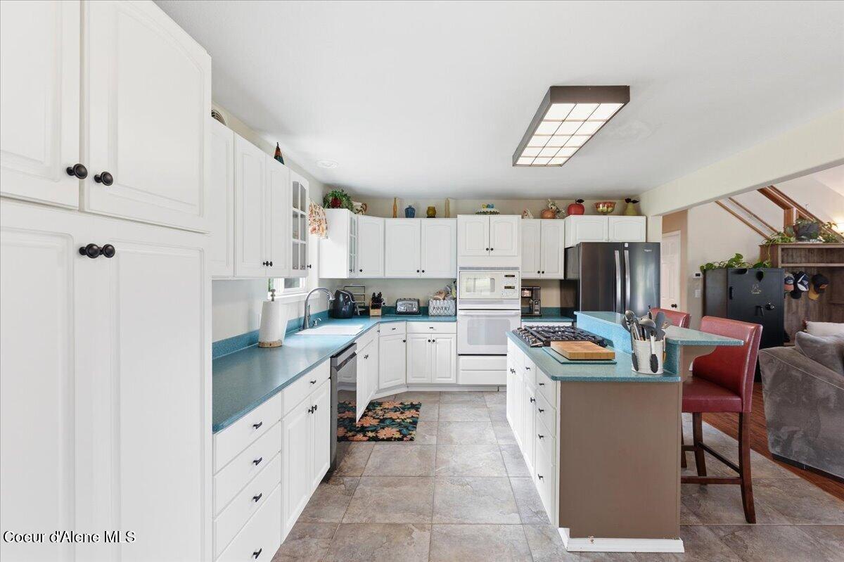3061 East Lancaster Road Hayden, ID 83835 - Photo 19 of 49 Side Kitchen