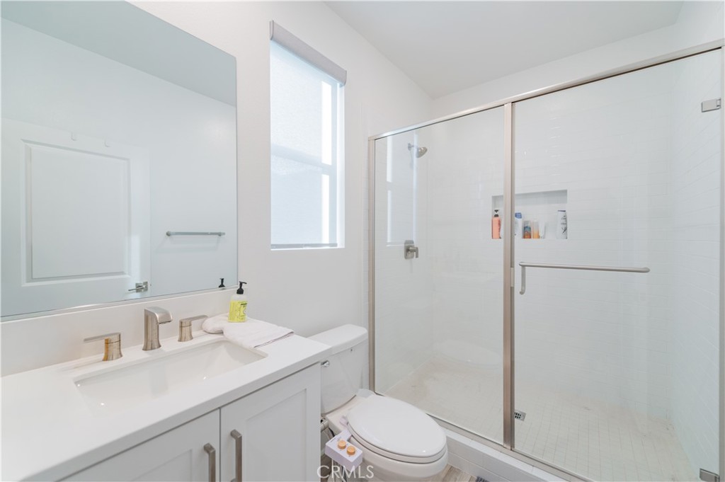 168 Sash Irvine, CA 92618 - Photo 14 of 31 a bathroom with a sink a toilet and shower