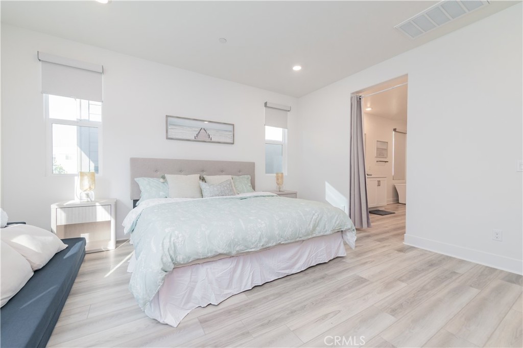 168 Sash Irvine, CA 92618 - Photo 16 of 31 a bedroom with a bed and a couch