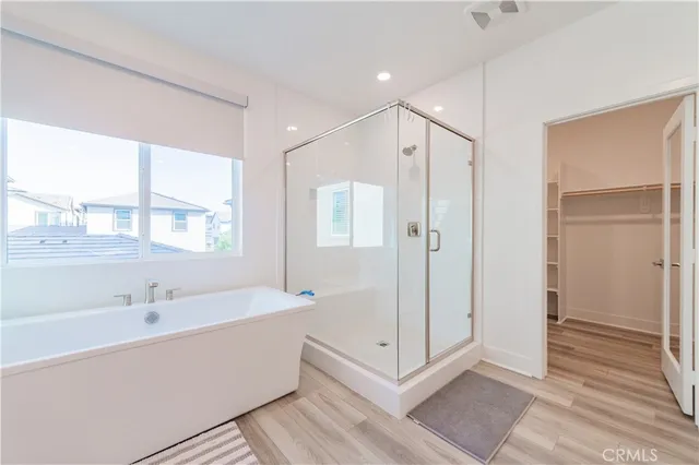 a view of a bathroom with a tub shower and sink