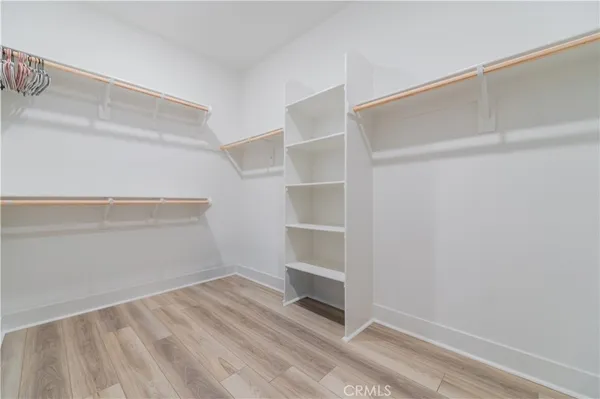 a view of an empty walk in closet