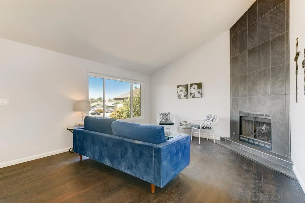2515 Trace Road Spring Valley, CA 91978 - Photo 5 of 25 a living room with furniture and a fireplace