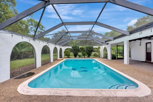 a view of a trees in front of a house