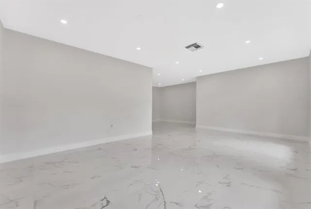 an empty room with window