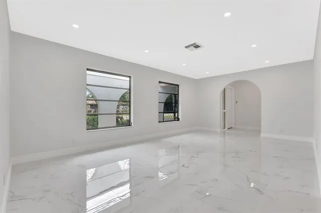 an empty room with windows