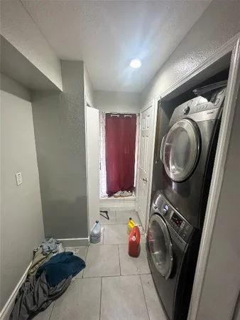 a storage room with washer and dryer
