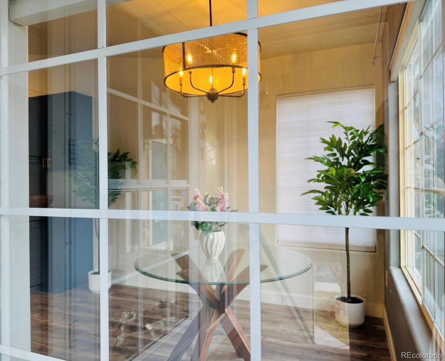 8468 South Thunder Ridge Way, Unit 202 Highlands Ranch, CO 80126 - Photo 8 of 21 a glass door with a glass door and glass door