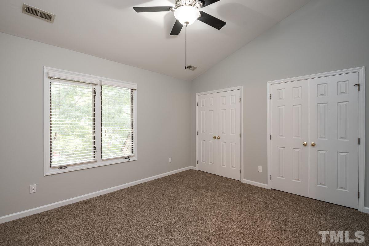 4213 Sunshadow Lane Raleigh, NC 27613 - Photo 15 of 20 a view of an empty room with a window