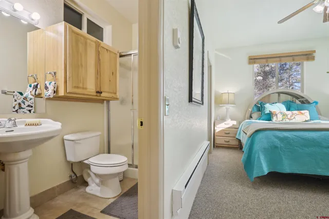 a view of a building with mountains in the background