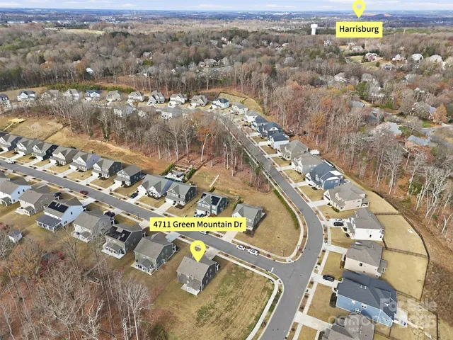 a view of a lake with a yard