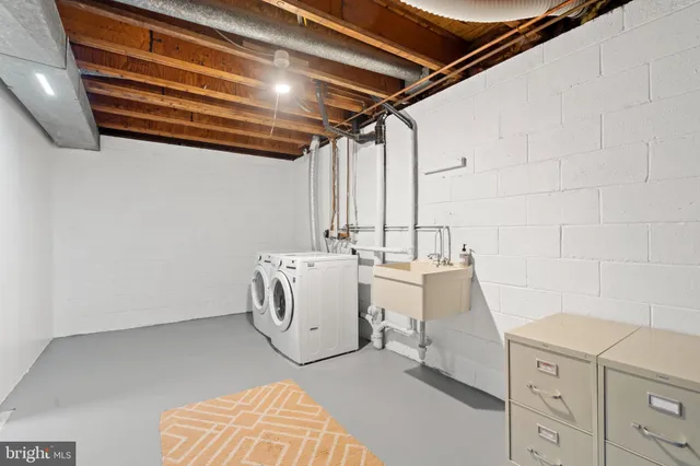 a utility room with cabinets