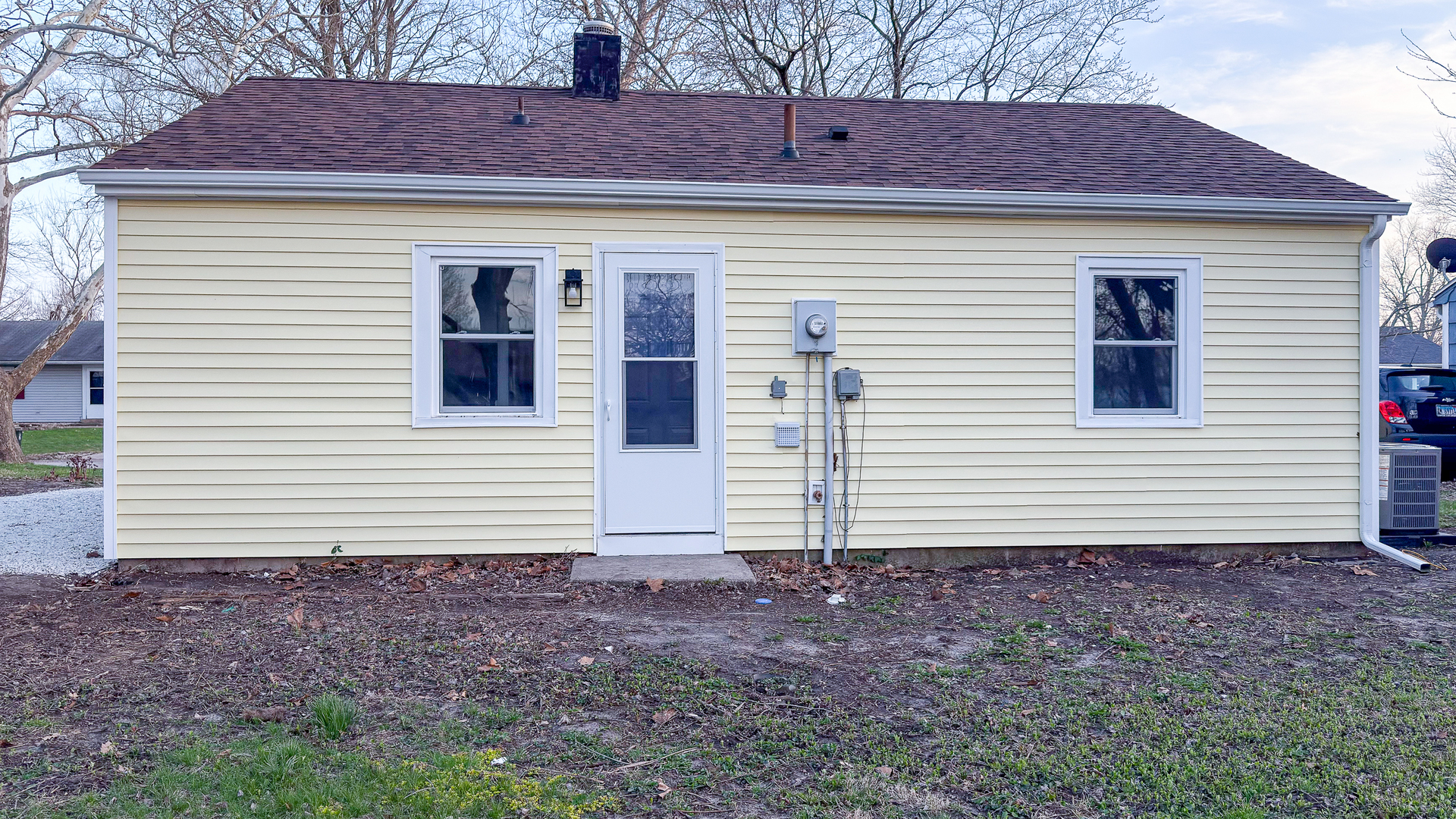 1037 Eastview Drive Rantoul, IL 61866 - Photo 4 of 21 a view of a house with a yard