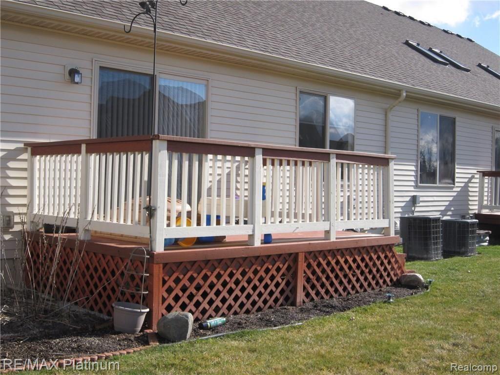 4663 Summer Ridge Drive Howell, MI 48843 - Photo 17 of 20 DECK OFF LIVING ROOM