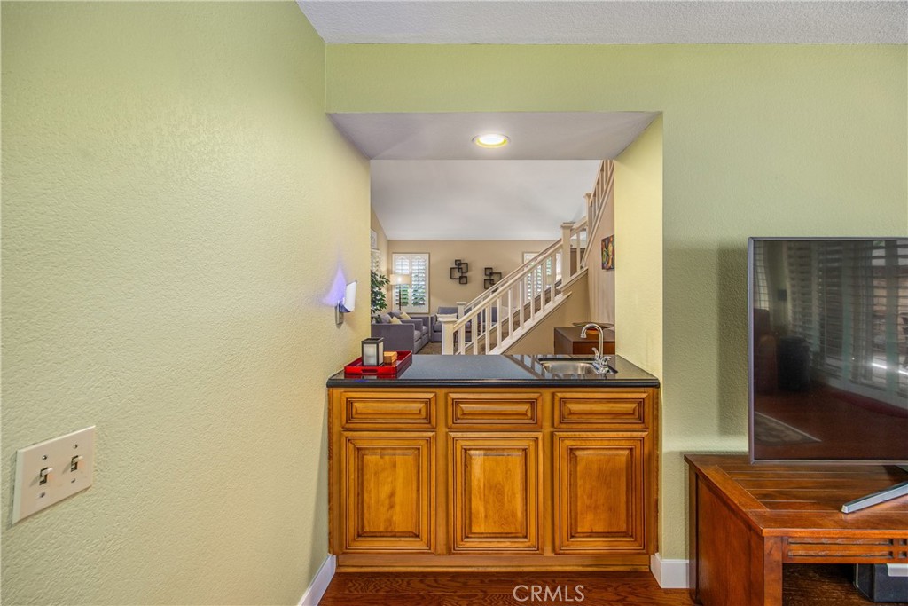 7751 Jack Rabbit Lane Highland, CA 92346 - Photo 18 of 50 a view of entryway and hall with wooden floor