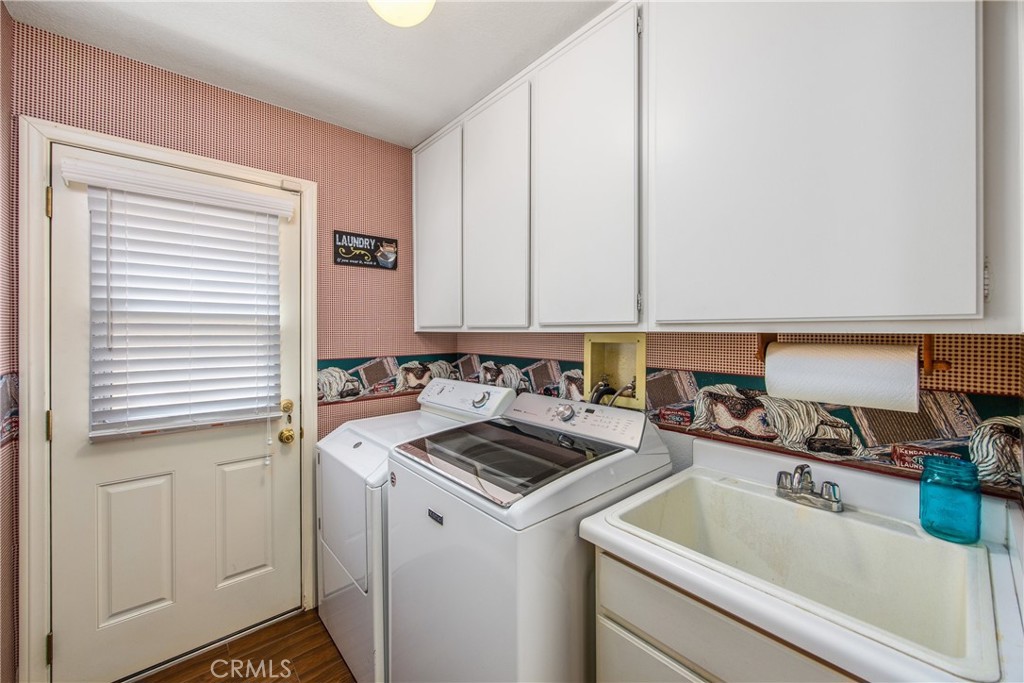 7751 Jack Rabbit Lane Highland, CA 92346 - Photo 35 of 50 a view of a kitchen with a sink and cabinets