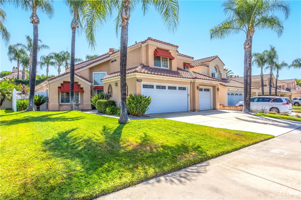 7751 Jack Rabbit Lane Highland, CA 92346 - Photo 48 of 50 a front view of house with yard and swimming pool