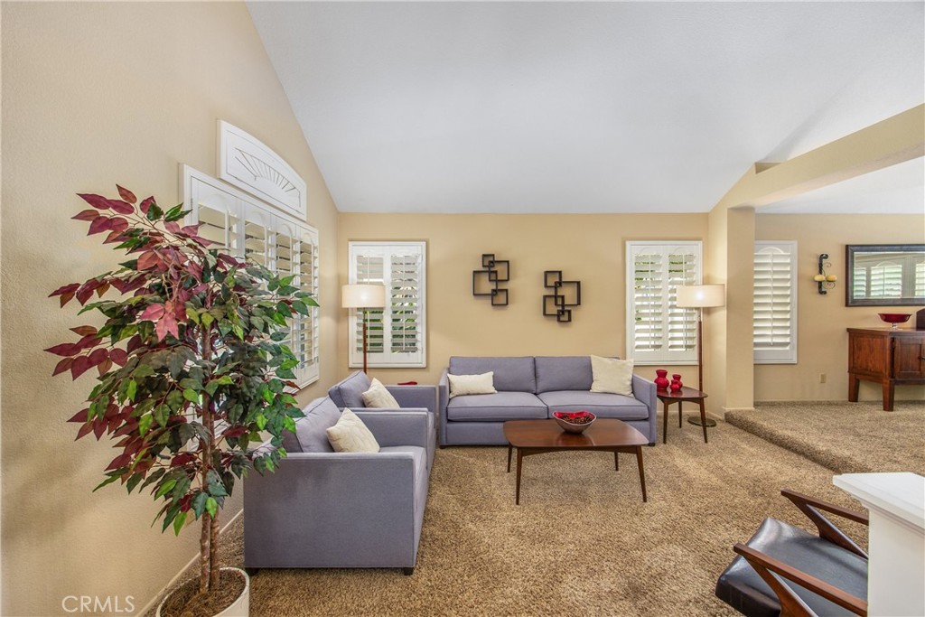 7751 Jack Rabbit Lane Highland, CA 92346 - Photo 6 of 50 a living room with furniture and a potted plant