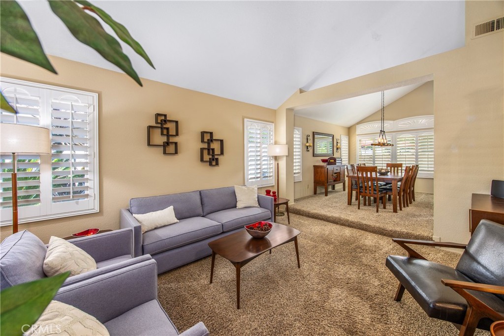 7751 Jack Rabbit Lane Highland, CA 92346 - Photo 7 of 50 a living room with furniture and a large window