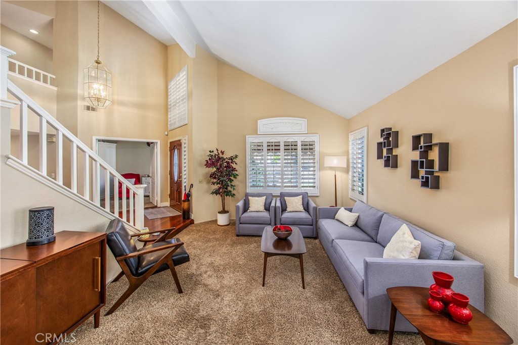 7751 Jack Rabbit Lane Highland, CA 92346 - Photo 8 of 50 a living room with furniture and a potted plant