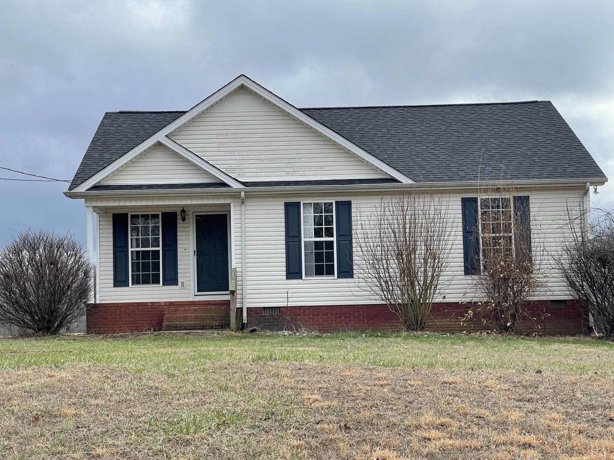 274 Johns Cemetery Road Pulaski, TN 38478 - Photo 1 of 13 front view of a house with a yard