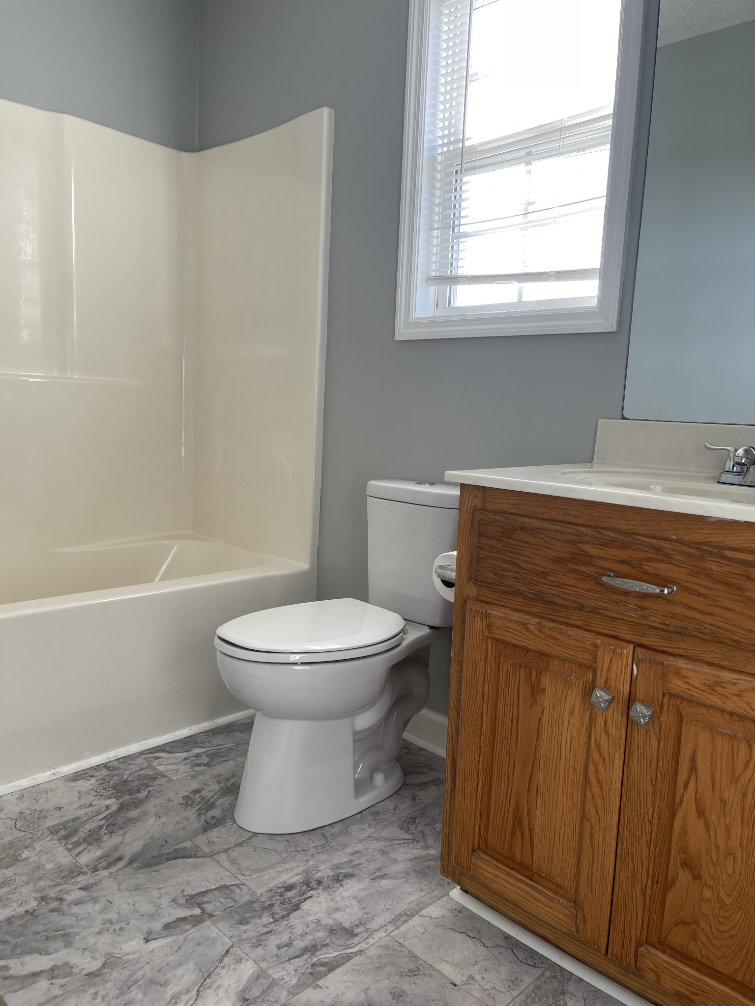 274 Johns Cemetery Road Pulaski, TN 38478 - Photo 7 of 13 a bathroom with a toilet a sink and a bathtub