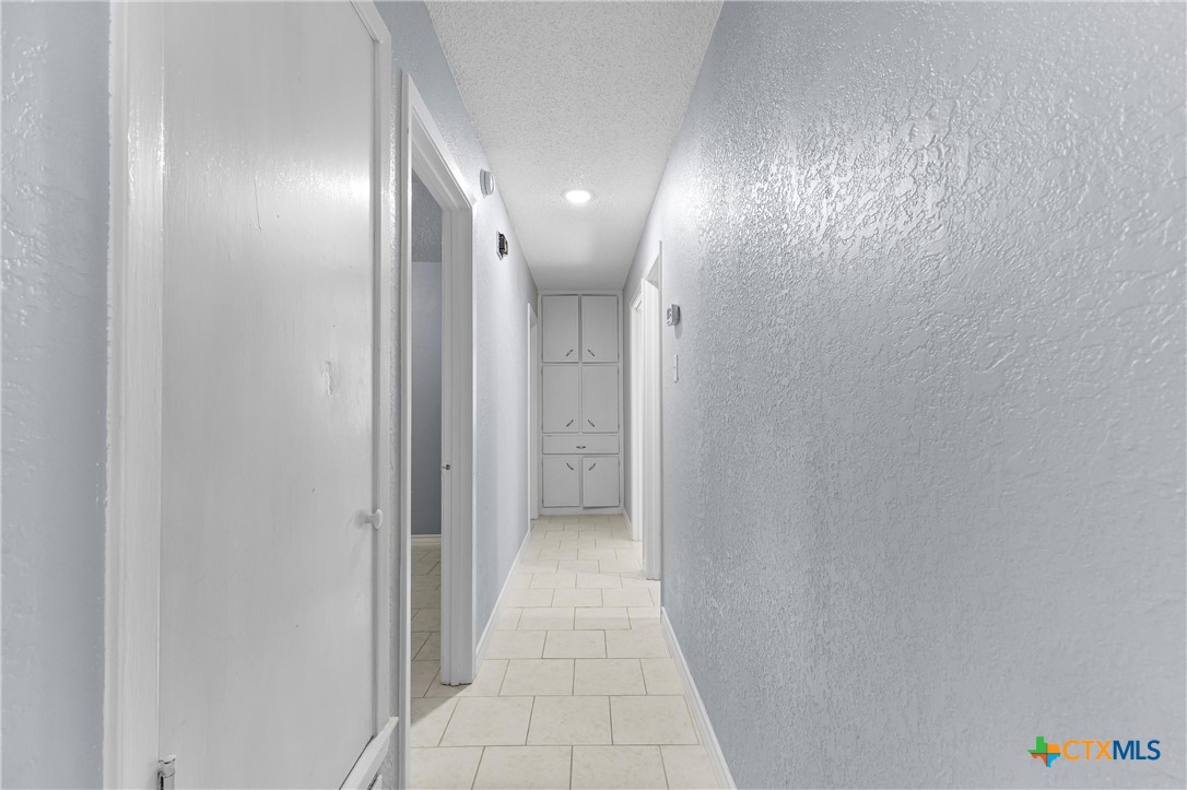 104 East Arlo Road Harker Heights, TX 76548 - Photo 16 of 35 a view of hallway with natural light