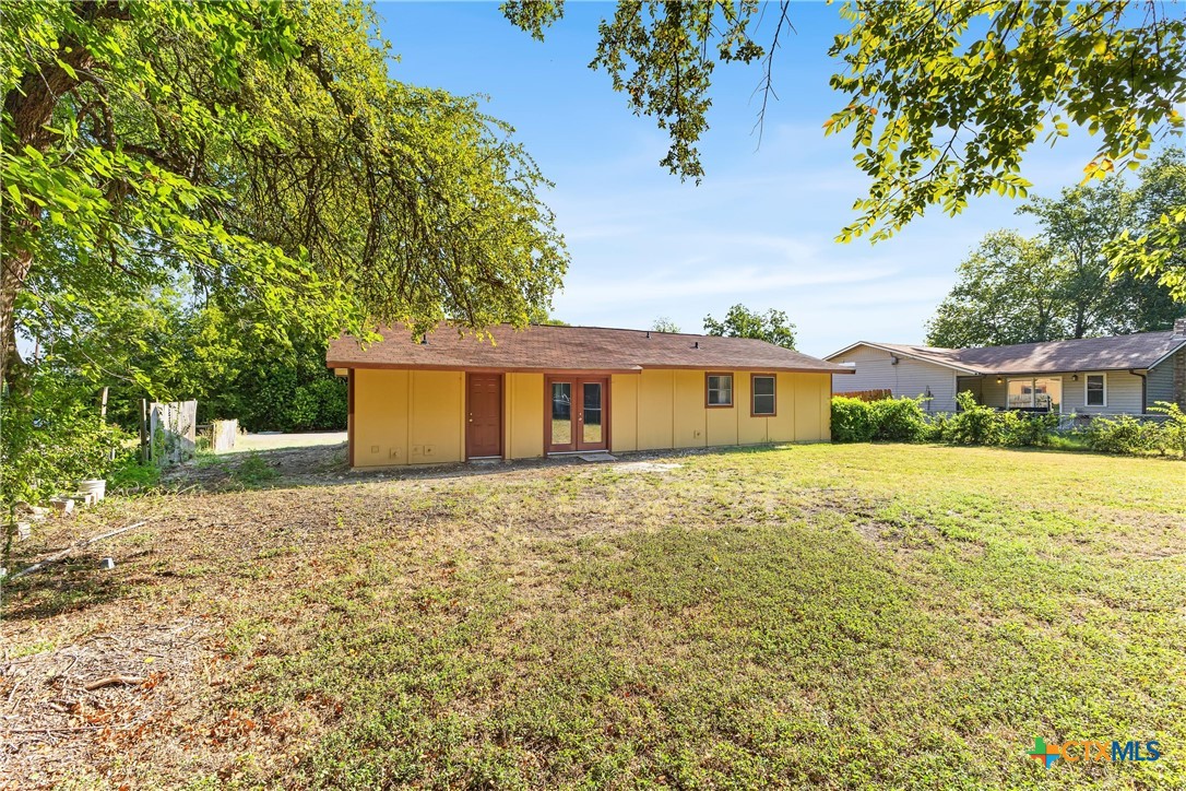 104 East Arlo Road Harker Heights, TX 76548 - Photo 29 of 35 a front view of a house with a yard and garage
