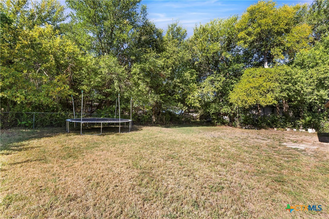 104 East Arlo Road Harker Heights, TX 76548 - Photo 31 of 35 a backyard of a house with lots of green space