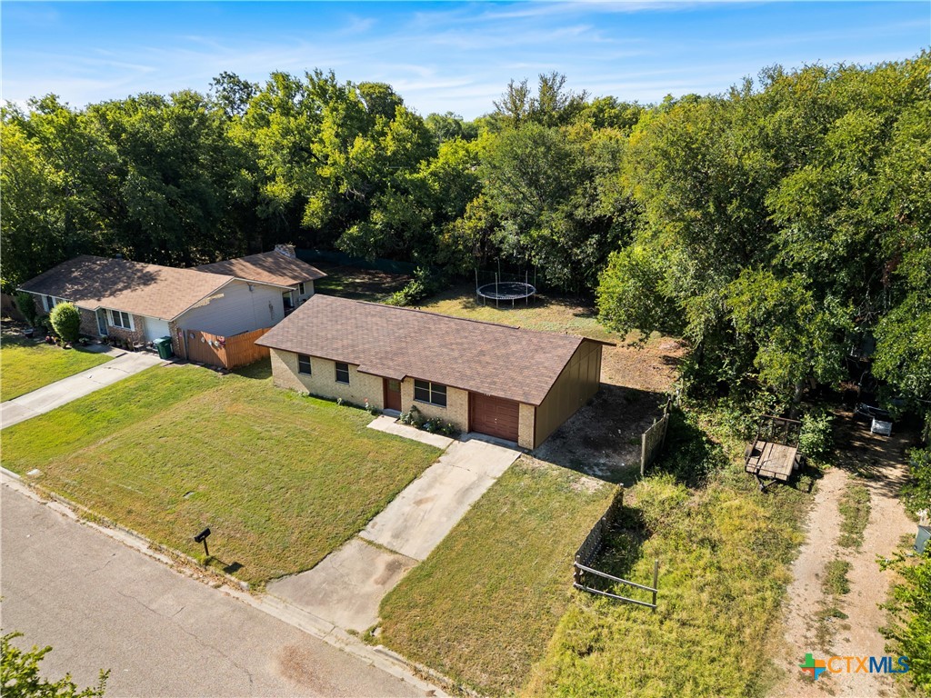 104 East Arlo Road Harker Heights, TX 76548 - Photo 34 of 35 an aerial view of residential houses with outdoor space and trees