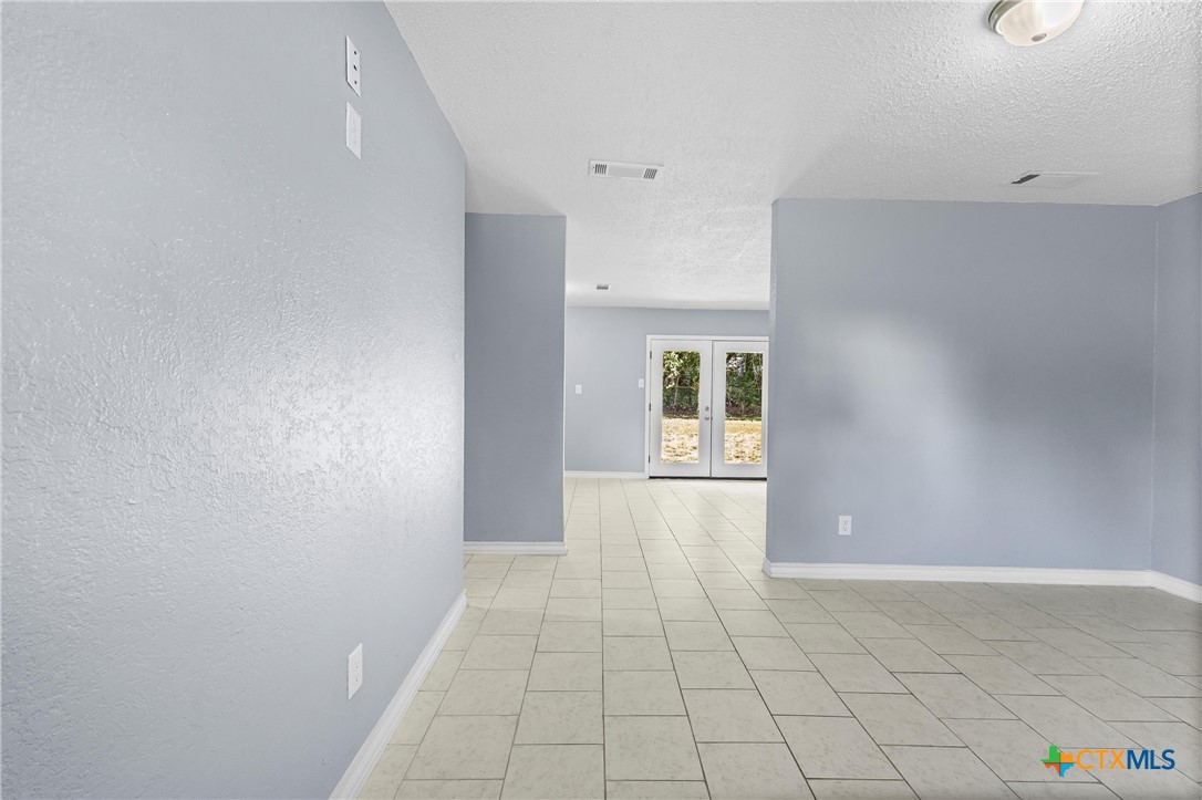 104 East Arlo Road Harker Heights, TX 76548 - Photo 9 of 35 a view of an empty room with a window