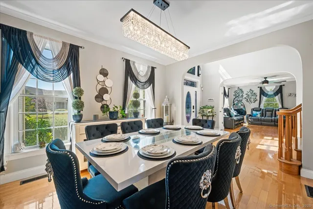 a view of a dining room with furniture window and outside view